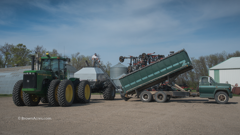 Filling borgault drill with beans John deere 9200 grain truck Brown Acres Custom Harvester Soybeans
